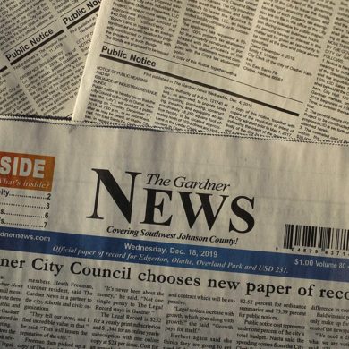 The Gardner News, with a front-page story on it's loosing status of the city's paper of record, is seen Friday, Dec. 20, 2019, in Gardner, Kan. The City Council voted to move legal ads to another publication in a nearby city as a cost-saving move only weeks after the city's mayor and a council member accused the paper of publishing inaccurate material. (AP Photo/Charlie Riedel)